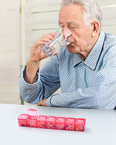 an old person drinking water from a glass