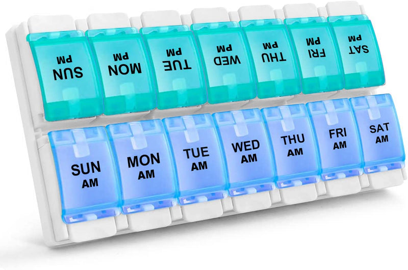 a plastic pill box with blue and white plastic containers with text: 'PM PM SUN PM PM MON PM TUE WED PM PM THU FRI SAT SUN MON TUE WED THU FRI SAT AM AM AM AM AM AM AM'