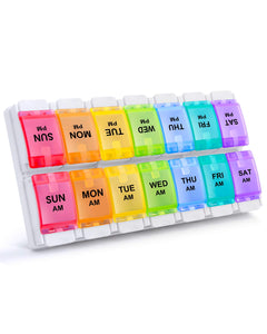 a plastic pill box with different colors of plastic with text: 'PM PM PM SUN PM MON PM TUE PM WED PM THU FRI SAT SUN MON TUE WED THU FRI SAT AM AM AM AM AM AM AM'