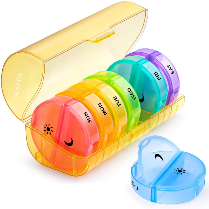 a plastic container with different colored containers with text: 'SUKUOS SUN MON TUE WED FRI SAT'