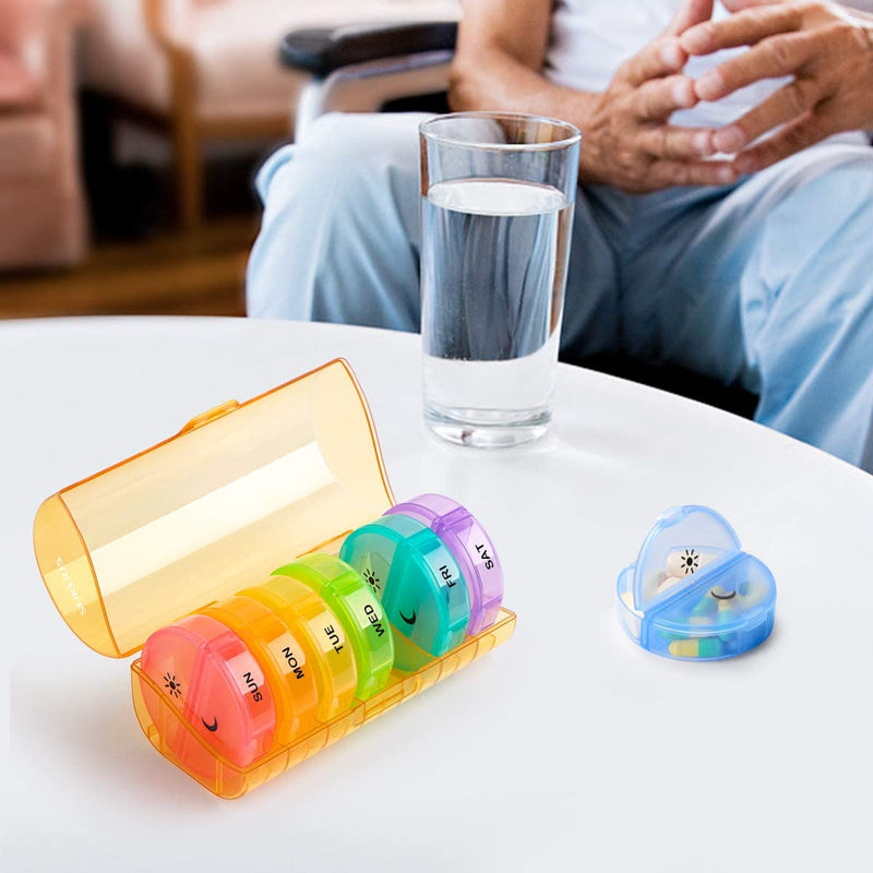 a pill box and a glass of water on a table with text: 'SUN MON TUE WED FRI SAT'