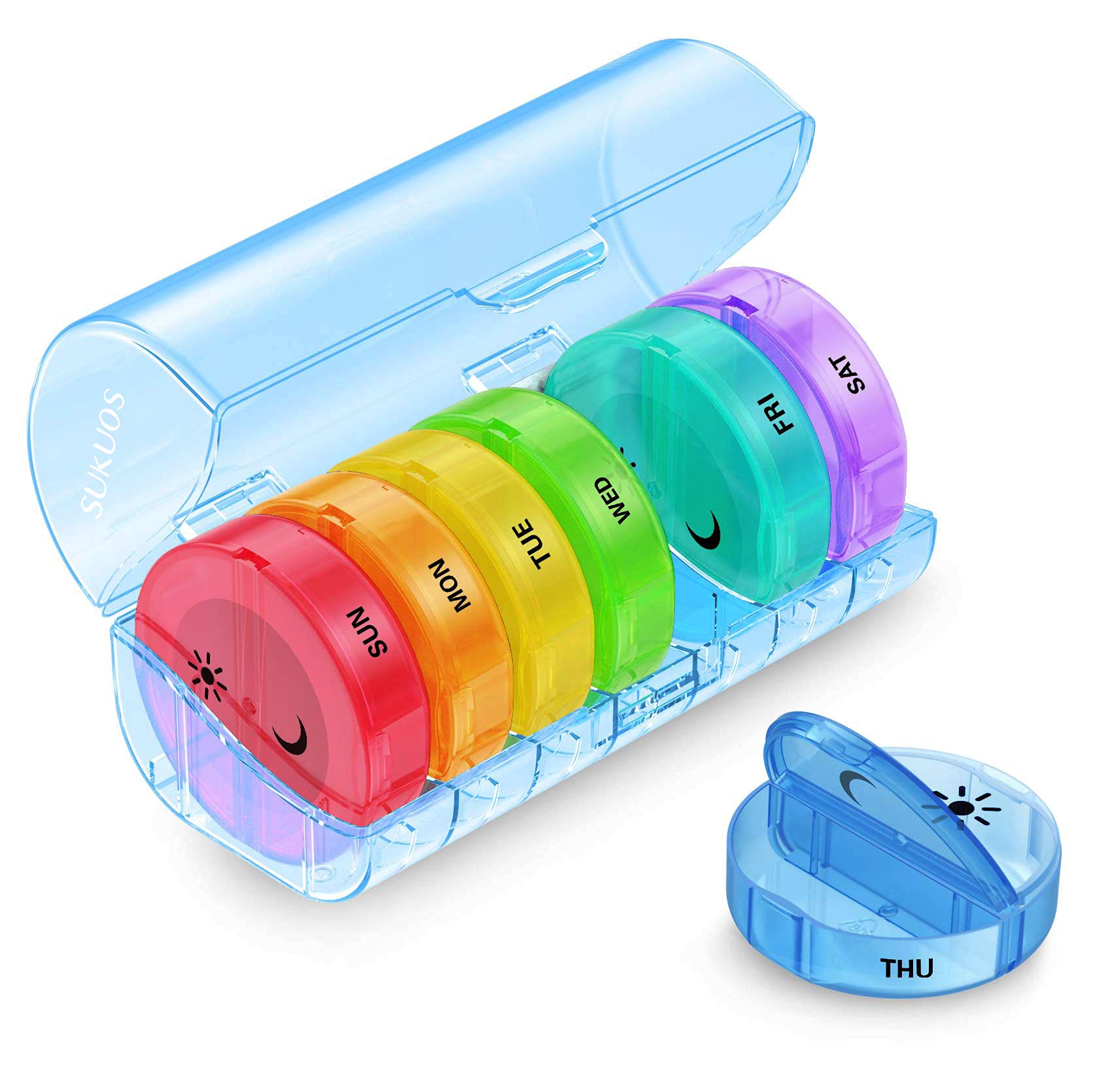 a plastic container with different colors of pills in it with text: 'SUKUOS SUN MON TUE THU WED . FRI SAT'