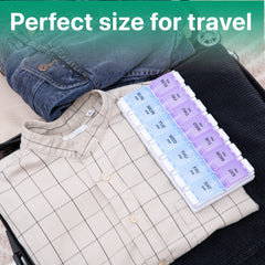 a shirt and a pill box on a suitcase with text: 'PM PM PM PM PM PM SUN PM THU WED TUE MON SAT SUN MON TUE WED THU AM FRI AM AM SAT AM AM AM AM Perfect size for travel'